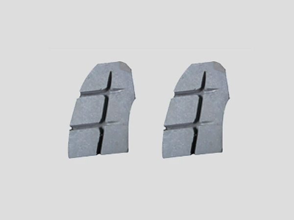 What factors affect the friction coefficient of brake shoes?
